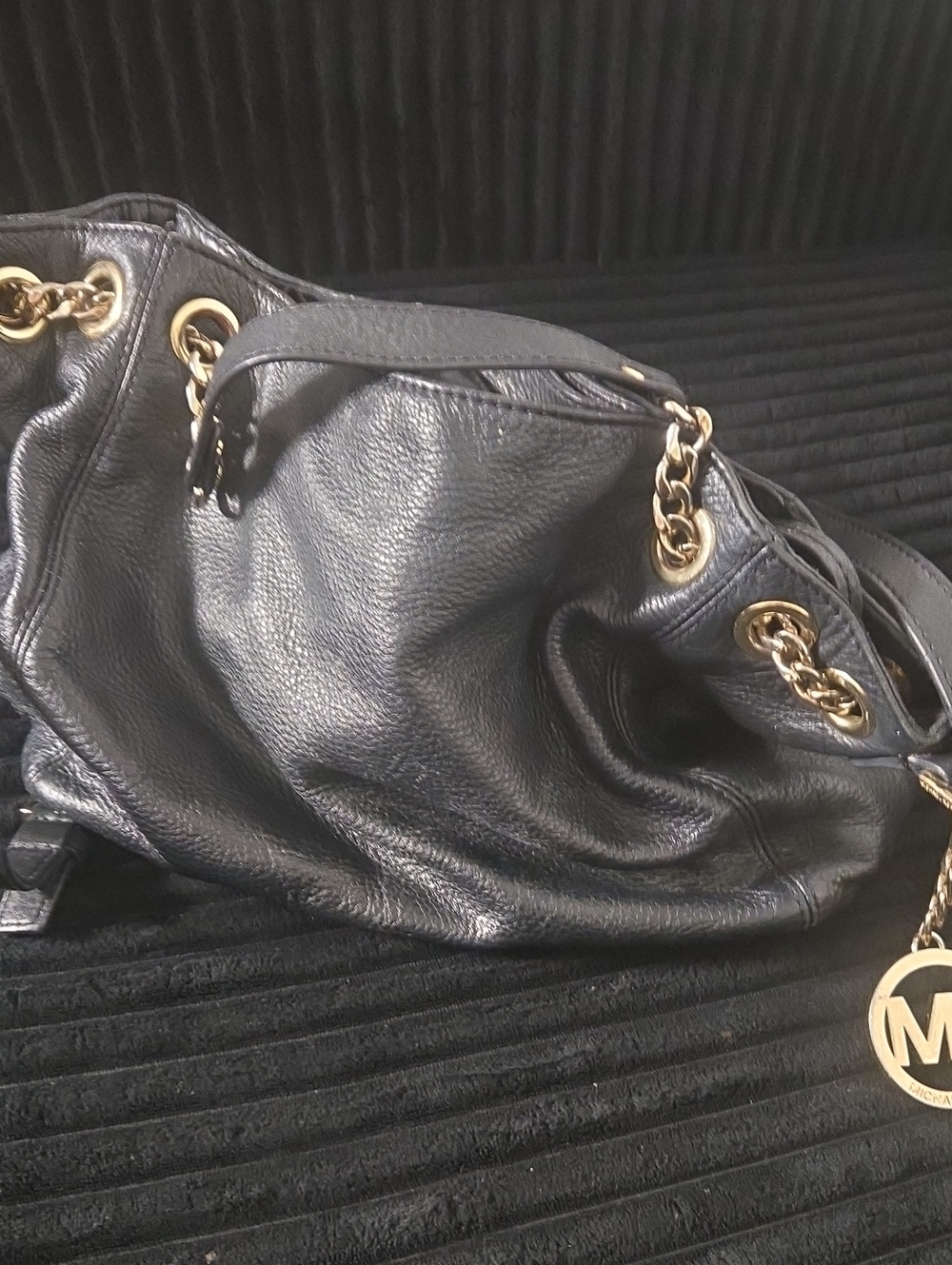 Black Leather Shoulder Bag with Gold Chain Accents